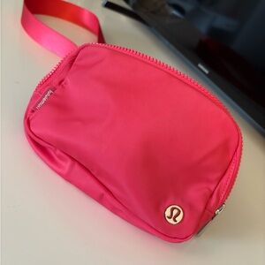 lululemon athletica bright pink coral belt bag with adjustable strap